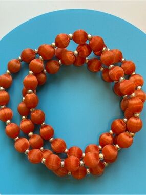 Orange Silk Thread Covered Necklace With Gold Spacer Beads